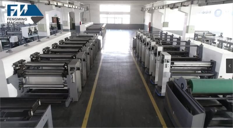 Système de guidage Web et chargement/déchargement automatique pour une machine d'impression unitaire
